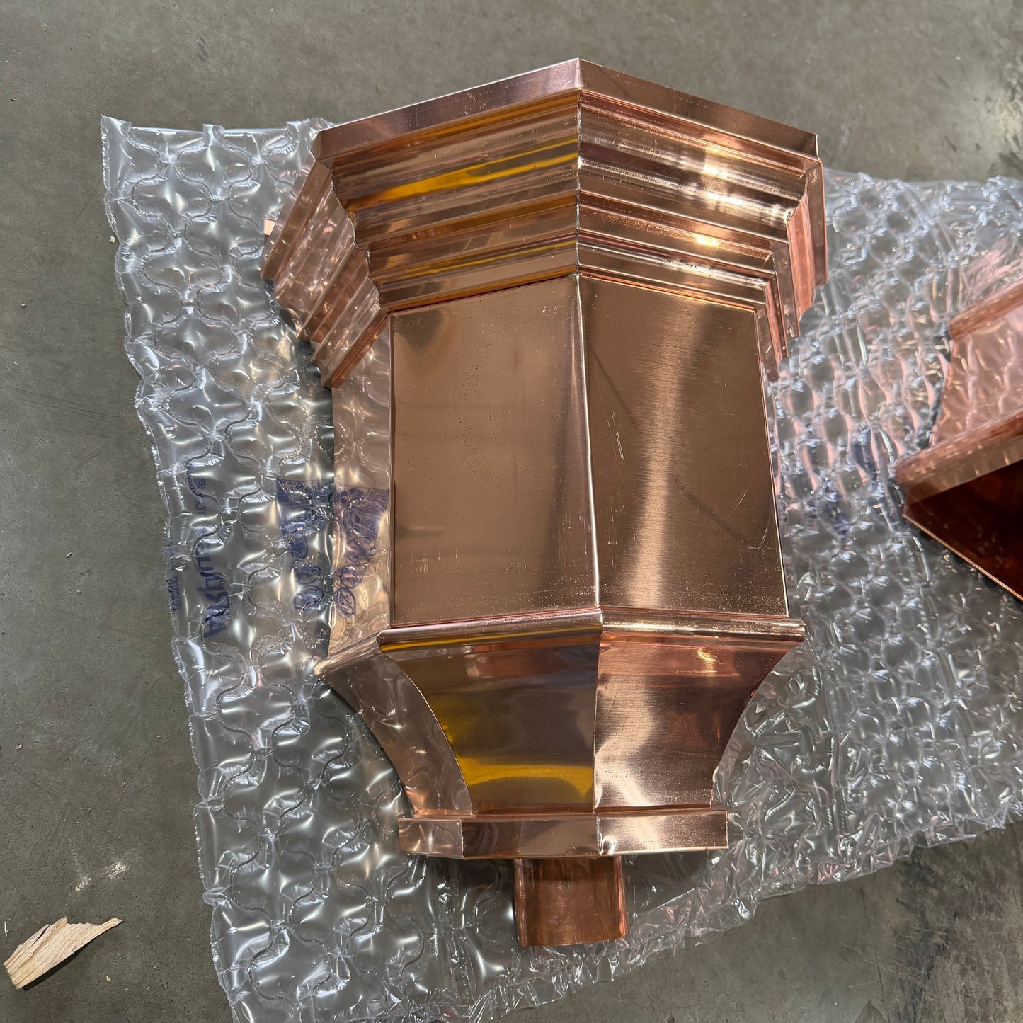 Copper conductor head 16x15x10 leader head rain head collection box crown molding tapered design gutter downspout overflow protection natural patina custom home architectural detail - GutterAll Damascus Oregon