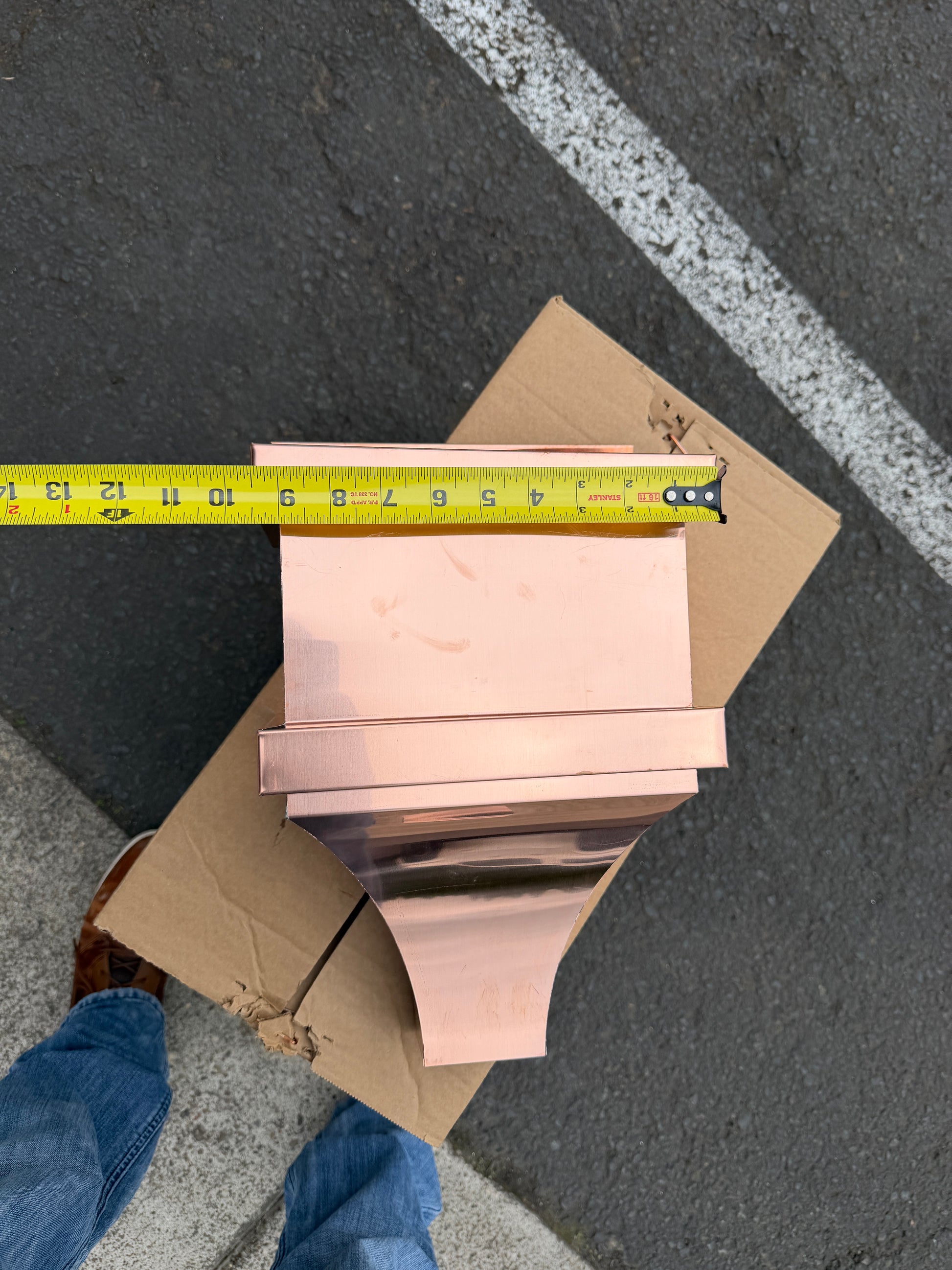 Small copper conductor head single crown style 10x6x13 inch leader head rain collector box featuring single crown top smooth curved face decorative bands and 2x3 square downspout outlet in bright mill finish 16 oz copper by GutterAll Damascus Oregon