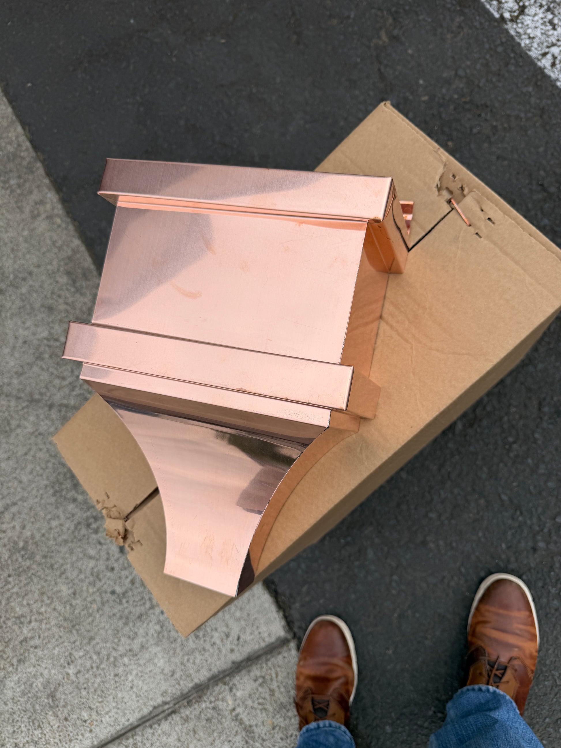 Small copper conductor head single crown style 10x6x13 inch leader head rain collector box featuring single crown top smooth curved face decorative bands and 2x3 square downspout outlet in bright mill finish 16 oz copper by GutterAll Damascus Oregon