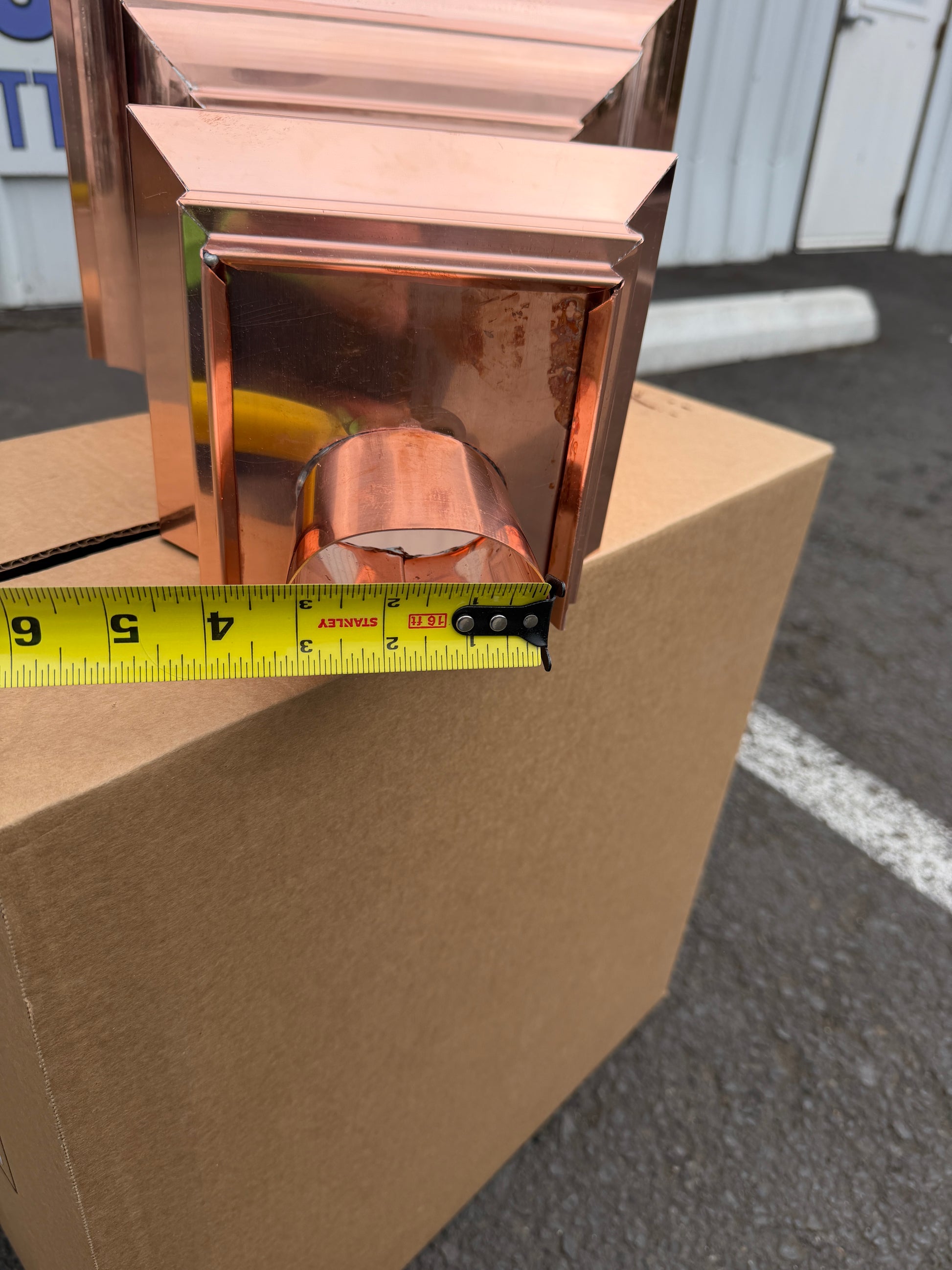 Copper conductor head crown style 14x10x14 inch leader head rain collector box featuring decorative crown profile stacked molding deep curved bowl and 2x3 oval downspout outlet in bright mill finish 16 oz copper by GutterAll Damascus Oregon