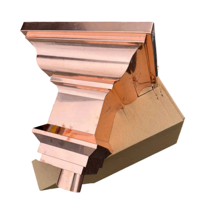 Copper conductor head crown style 14x10x14 inch leader head rain collector box featuring decorative crown profile stacked molding deep curved bowl and 2x3 oval downspout outlet in bright mill finish 16 oz copper by GutterAll Damascus Oregon