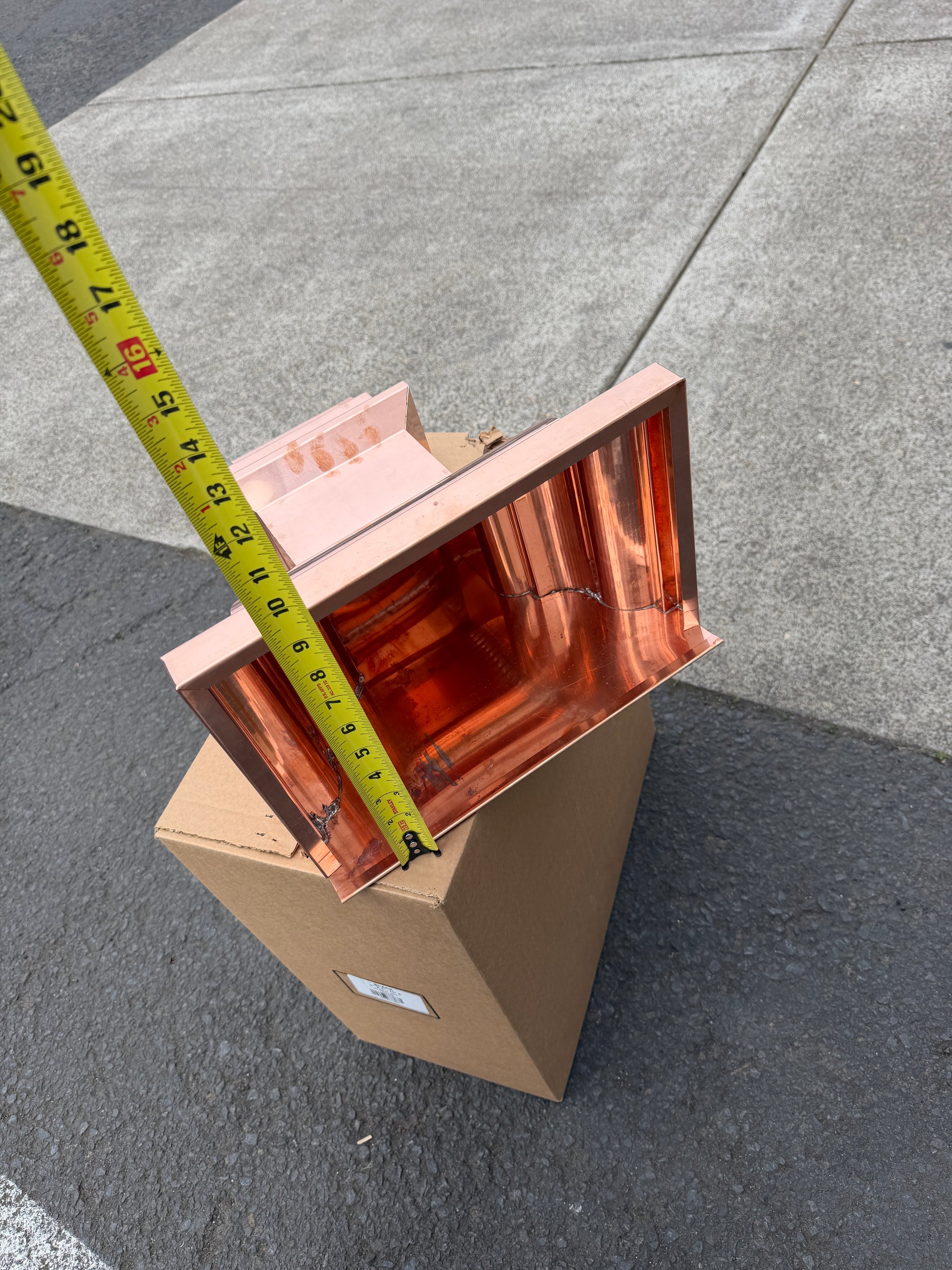 Copper conductor head crown style 14x10x14 inch leader head rain collector box featuring decorative crown profile stacked molding deep curved bowl and 2x3 oval downspout outlet in bright mill finish 16 oz copper by GutterAll Damascus Oregon
