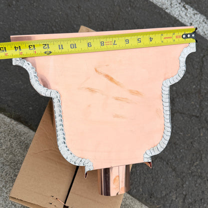 Copper conductor head leader head rain collector box 14x10x11 inch crown molding design smooth curved front 2x3 oval outlet polished copper finish architectural gutter accessory custom homes upscale remodels GutterAll Damascus Oregon