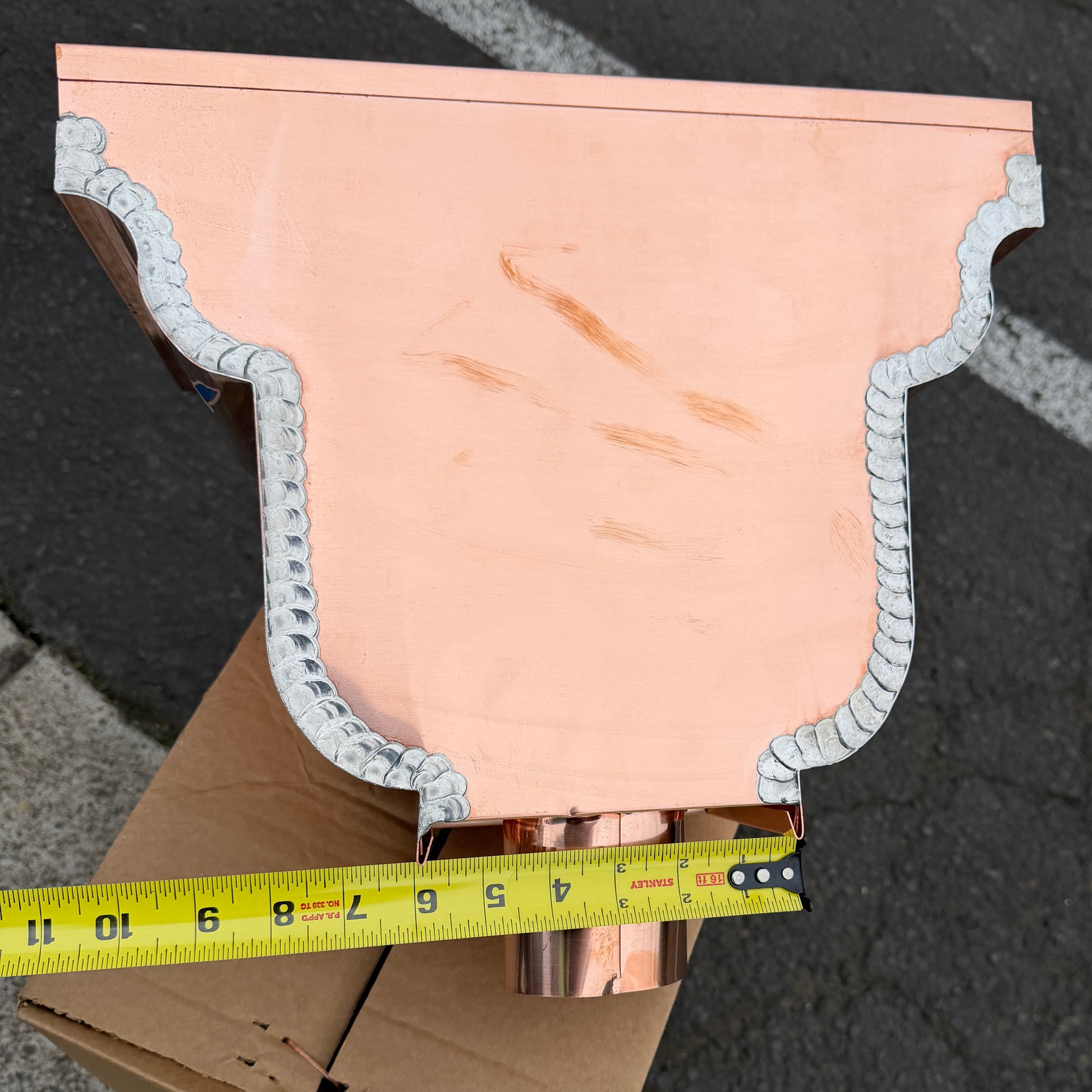 Copper conductor head leader head rain collector box 14x10x11 inch crown molding design smooth curved front 2x3 oval outlet polished copper finish architectural gutter accessory custom homes upscale remodels GutterAll Damascus Oregon