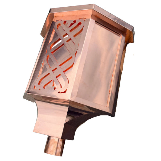 Ornamental copper conductor head with scroll cut decorative lattice front panel 18x8.5x20 inch leader head rain collector box featuring peaked gabled top faceted hexagonal body and 2x3 oval downspout outlet in bright mill finish 16 oz copper by GutterAll Damascus Oregon