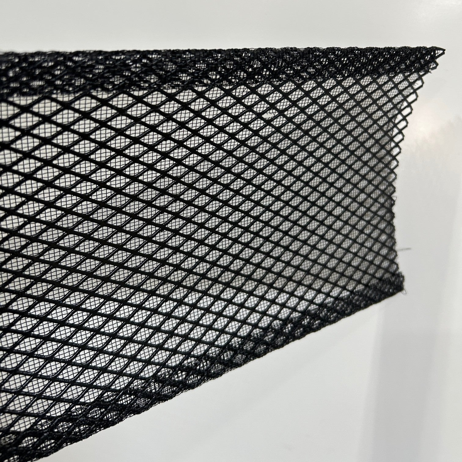 Multiple angle views of Ironwood gutter guard showing mesh design and installation flexibility