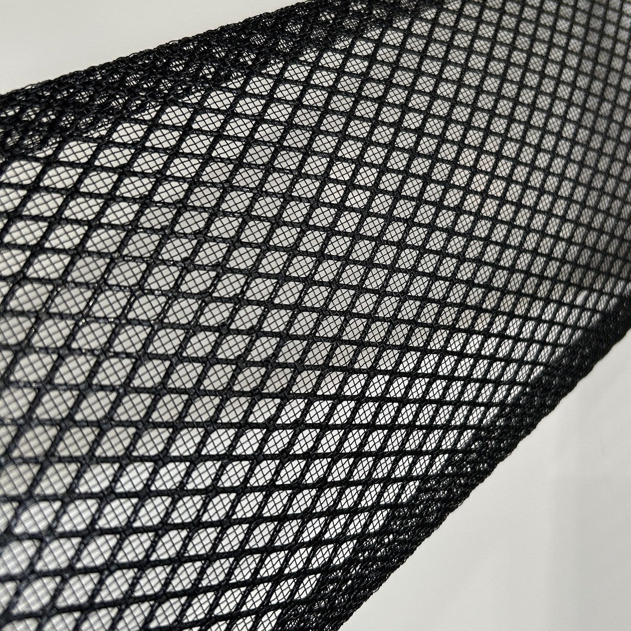 Multiple angle views of Ironwood gutter guard showing mesh design and installation flexibility