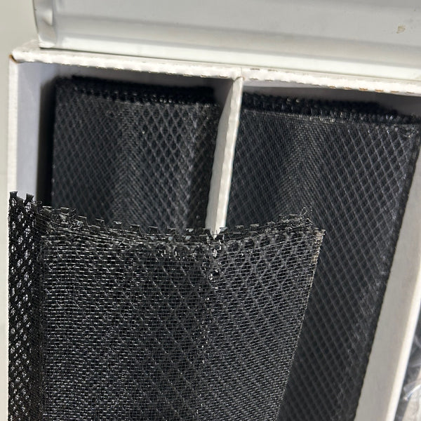 Close-up of Ironwood gutter guard mesh material showing fine openings that filter debris while allowing water flow
