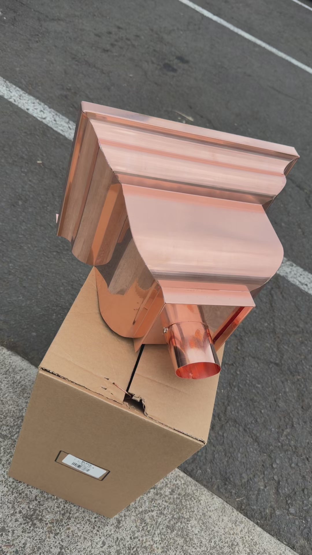 Copper conductor head leader head rain collector box 14x10x11 inch crown molding design smooth curved front 2x3 oval outlet polished copper finish architectural gutter accessory custom homes upscale remodels GutterAll Damascus Oregon