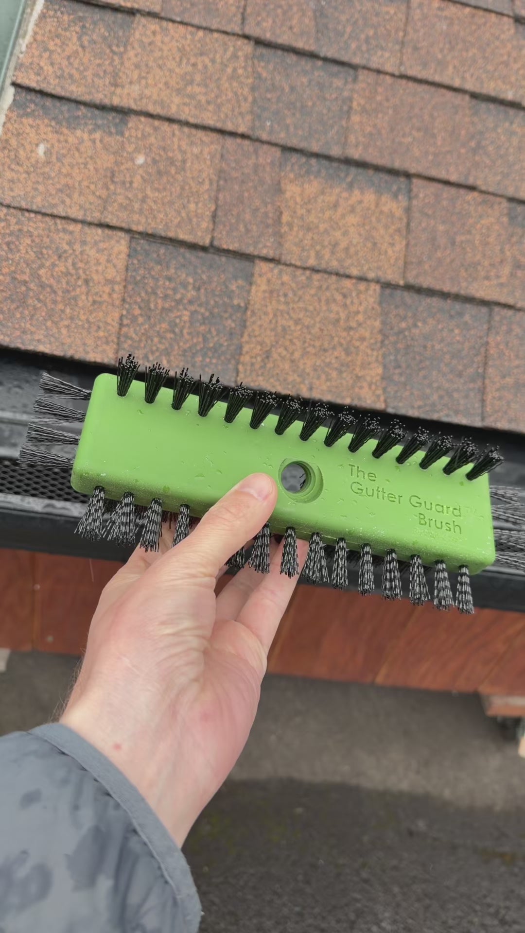 Gutterglove gutter guard cleaning brush green plastic 3-sided black bristles extension pole mount GutterAll Damascus Oregon