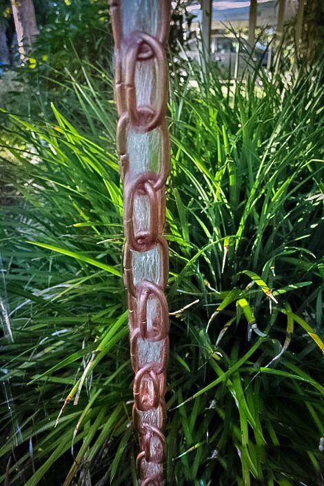 Double link copper rain chain sold in 8ft sections. Extra link inset for superior water flow. Pure solid copper. Natural patina. Contractor DIY. Damascus OR.