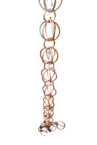 Round spheres rain chain with copper finish and orbital design.