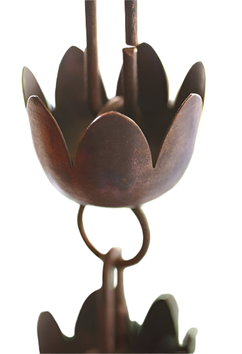 Close-up of a handcrafted tulip copper cup rain chain with a natural patina.