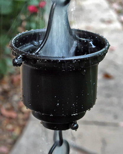 Black Tea Cup Rain Chain. Aluminum with black powder coat. 8ft section with 16 cups. 4-1/4" x 3" x 1" cups. Stainless hardware. V-hook included. Easy no-tool assembly. Contractor DIY. Damascus OR.