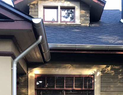 6-inch Half-Round Style Gutter showcasing traditional design perfect for historic homes, available in copper and aluminum finishes