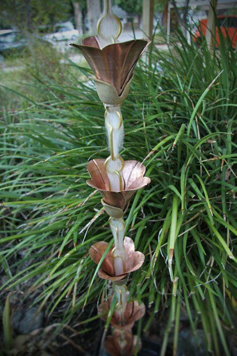 Full view of Cast Flower 2.0 rain chain with multiple copper cups.