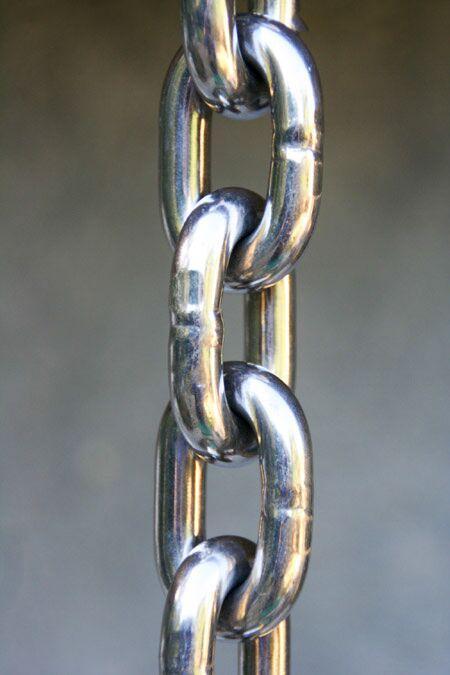 Detailed view of polished stainless steel chain with weather-resistant design.